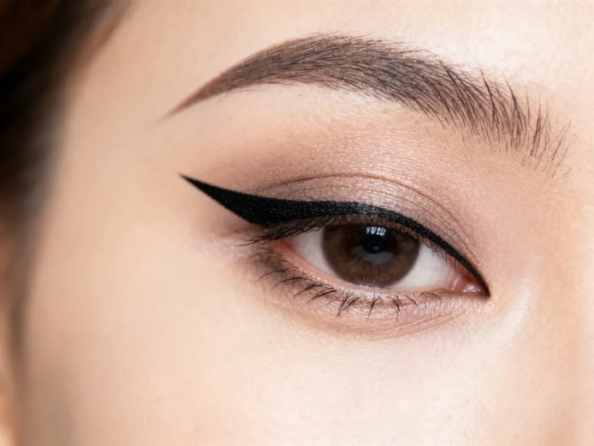 Dramatic winged eyeliner made with a flexible brush-tip pen